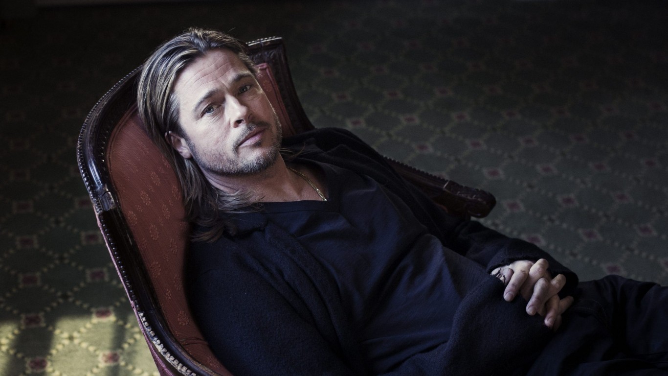 Brad Pitt Sitting On Chair Wallpaper for Desktop 1366x768