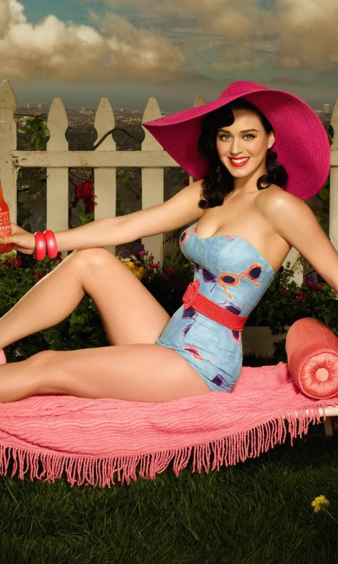 Katy Perry Lying On Chair Body Figure Wallpaper for HTC Desire HD