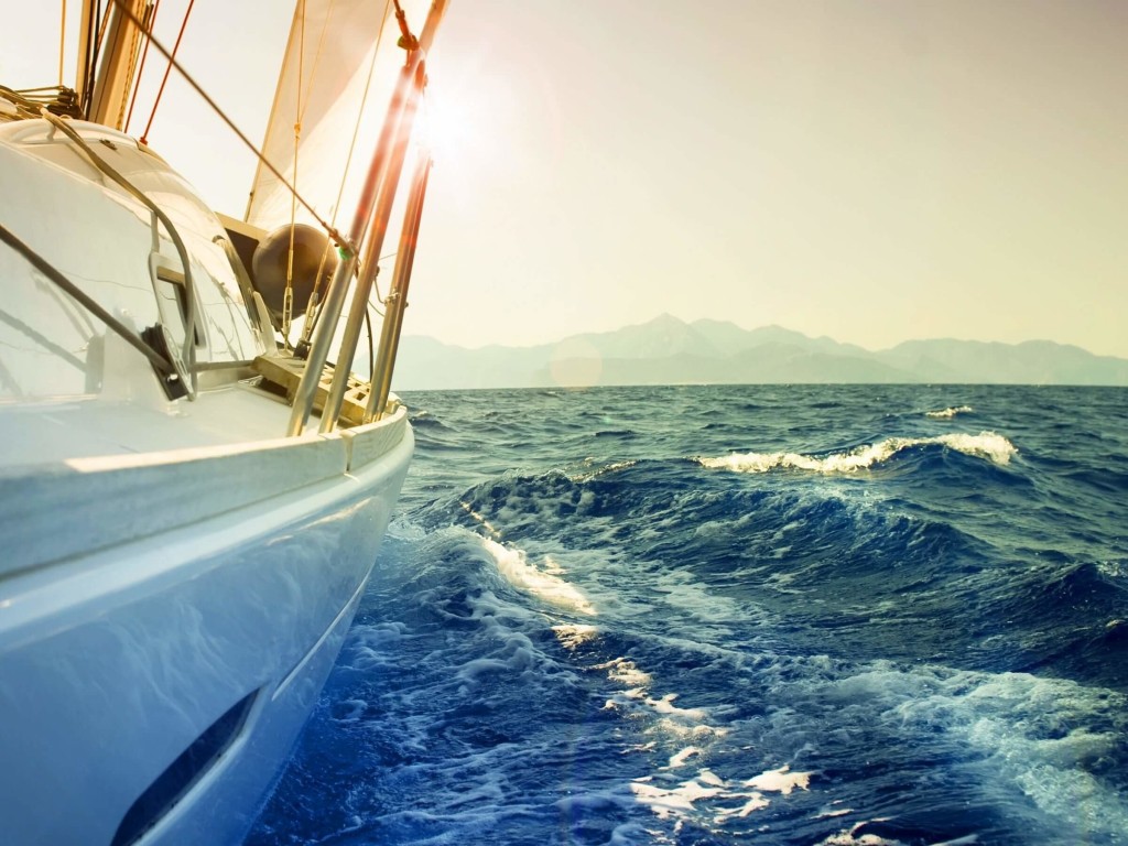 Yacht Sailing Downwind at Sunset Wallpaper for Desktop 1024x768