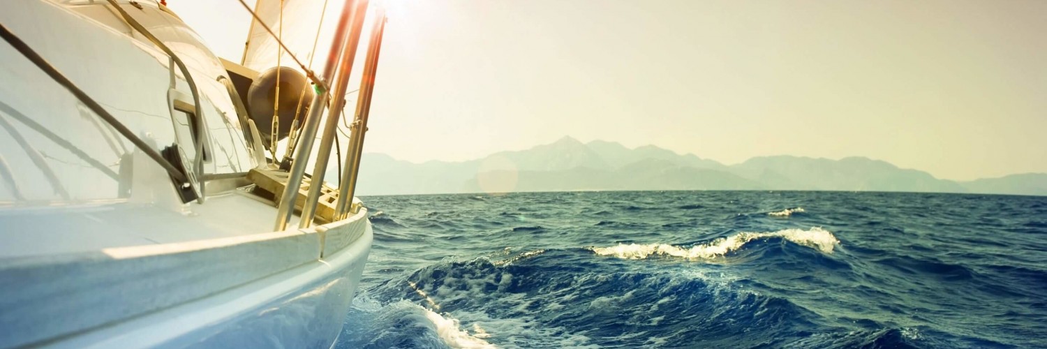 Yacht Sailing Downwind at Sunset Wallpaper for Social Media Twitter Header